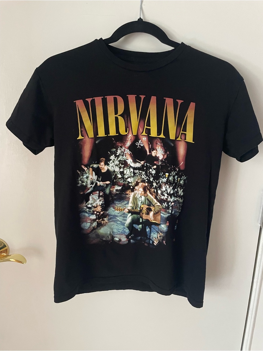 NIRVANA Black Tee with White Smiley Logo and Yellow Accent